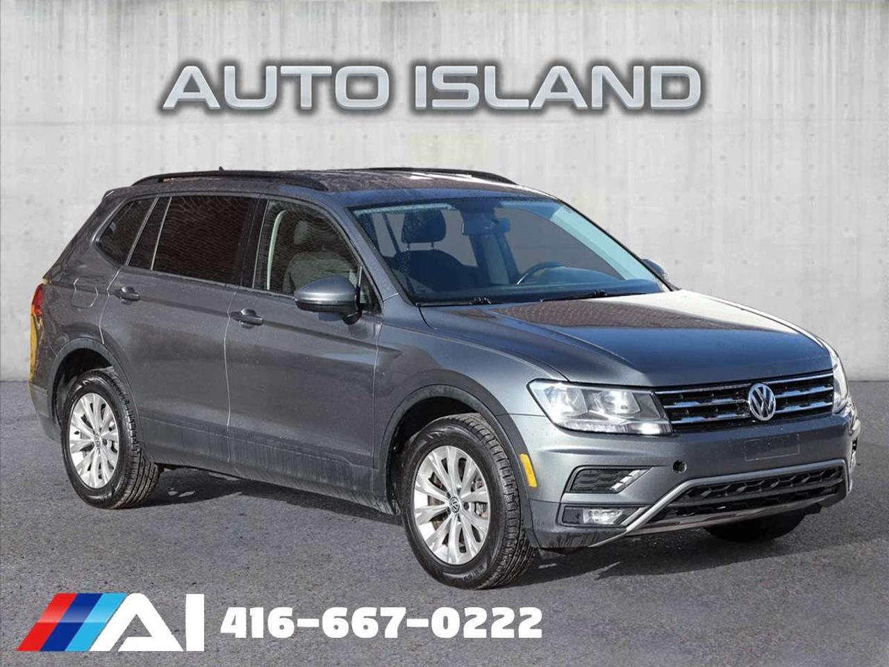 All-wheel drive, backup camera, heated seats, Bluetooth, keyless entry, air conditioning, power windows, and well-serviced. The 2018 Volkswagen Tiguan Trendline offers the versatility and reliability of AWD, ideal for both city driving and weekend adventures. Features like the backup camera and Bluetooth make for an easy and connected ride. <br><br>Auto Island Inc., North York<br>2555 Steeles Ave. West<br><br>www.autoislandinc.com <br><br>4.7 Google Rating and over 150 vehicles in stock, with more arriving daily! We take pride in offering top-quality vehicles and exceptional service. Our full-service mechanical shop is ready for all your maintenance needs, and every vehicle is professionally detailed and inspected – buy with confidence!<br><br>Payments as low as $0 down, up to 84 months, OAC. Good credit, bad credit, new credit? No problem – everyone’s approved! Easy online credit application available . Rates starting at 8.49% OAC – please call for details.<br><br>Please note: All prices are plus applicable taxes (HST) and licensing. No hidden surprises—just great vehicles and transparent deals. Certification is available for an additional $999. Without certification, as per OMVIC regulations, the vehicle is not drivable, not E-tested, and not certified.<br><br>Proudly serving the GTA and beyond: Peel, Halton, Brampton, Toronto, Burlington, Milton, Mississauga, Hamilton, Cambridge, London, Kitchener, Guelph, Orangeville, Newmarket, Barrie, Markham, Bolton, Caledon, Vaughan, Woodbridge, Etobicoke, Oakville, and more.<br><br>We carry all makes and models, including Mercedes, BMW, Audi, Jaguar, VW, Maserati, Porsche, Land Rover, Range Rover, Chrysler, Jeep, Honda, Toyota, Lexus, Infiniti, Acura, and more.<br><br> <br><br><br><br><br><br> <br><br><br><br><br><br><br><br><br>
