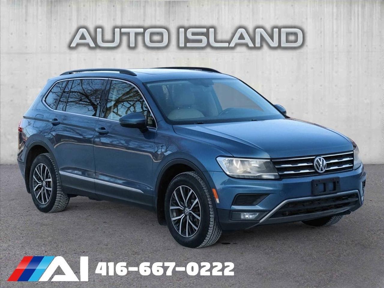 PANORAMIC SUNROOF, HEATED SEATS, BACKUP CAMERA, APPLE CARPLAY & ANDROID AUTO, ALLOY WHEELS, POWER DRIVERS SEAT, DUAL-ZONE CLIMATE CONTROL, BLIND SPOT MONITOR — ACCIDENT-FREE AND DEALER SERVICED!    This 2018 Volkswagen Tiguan Comfortline blends European refinement with everyday versatility. Featuring a panoramic sunroof, heated front seats, and smartphone connectivity through Apple CarPlay and Android Auto, it’s designed for comfort and convenience. The power driver’s seat, backup camera, and dual-zone climate control enhance the experience, while VW’s 4MOTION all-wheel drive and blind spot monitoring add confidence to every drive. Accident-free and dealer serviced, it’s a smart, stylish SUV that’s ready for wherever you’re headed.         Auto Island Inc., North York  2555 Steeles Ave. West    www.autoislandinc.com     4.7 Google Rating and over 150 vehicles in stock, with more arriving daily! We take pride in offering top-quality vehicles and exceptional service. Our full-service mechanical shop is ready for all your maintenance needs, and every vehicle is professionally detailed and inspected – buy with confidence!    Payments as low as $0 down, up to 84 months, OAC. Good credit, bad credit, new credit? No problem – everyone’s approved! Easy online credit application available . Rates starting at 6.95% OAC – please call for details.    Please note: All prices are plus applicable taxes (HST) and licensing. No hidden surprises—just great vehicles and transparent deals. Certification is available for an additional $899. Without certification, as per OMVIC regulations, the vehicle is not drivable, not E-tested, and not certified.    Proudly serving the GTA and beyond: Peel, Halton, Brampton, Toronto, Burlington, Milton, Mississauga, Hamilton, Cambridge, London, Kitchener, Guelph, Orangeville, Newmarket, Barrie, Markham, Bolton, Caledon, Vaughan, Woodbridge, Etobicoke, Oakville, and more.    We carry all makes and models, including Mercedes, BMW, Audi, Jaguar, VW, Maserati, Porsche, Land Rover, Range Rover, Chrysler, Jeep, Honda, Toyota, Lexus, Infiniti, Acura, and more.