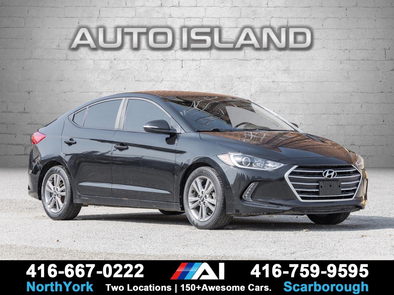 HEATED SEATS, HEATED STEERING WHEEL, APPLE CARPLAY/ANDROID AUTO, BACKUP CAMERA, BLUETOOTH, ALLOY WHEELS, BLIND SPOT MONITORING, AUTOMATIC TRANSMISSION.      C ombines comfort, tech, and safety in one stylish package. Enjoy modern features like Apple CarPlay and Android Auto, heated seats, and a heated steering wheel, while blind spot monitoring and a backup camera add extra peace of mind. With Bluetooth connectivity, alloy wheels, and a smooth automatic transmission, this Elantra offers excellent value and reliability for everyday driving.    Auto Island Inc., North York  2555 Steeles Ave. West    www.autoislandinc.com     4.7 Google Rating and over 150 vehicles in stock, with more arriving daily! We take pride in offering top-quality vehicles and exceptional service. Our full-service mechanical shop is ready for all your maintenance needs, and every vehicle is professionally detailed and inspected – buy with confidence!    Payments as low as $0 down, up to 84 months, OAC. Good credit, bad credit, new credit? No problem – everyone’s approved! Easy online credit application available . Rates starting at 6.95% OAC – please call for details.    Please note: All prices are plus applicable taxes (HST) and licensing. No hidden surprises—just great vehicles and transparent deals. Certification is available for an additional $899. Without certification, as per OMVIC regulations, the vehicle is not drivable, not E-tested, and not certified.    Proudly serving the GTA and beyond: Peel, Halton, Brampton, Toronto, Burlington, Milton, Mississauga, Hamilton, Cambridge, London, Kitchener, Guelph, Orangeville, Newmarket, Barrie, Markham, Bolton, Caledon, Vaughan, Woodbridge, Etobicoke, Oakville, and more.    We carry all makes and models, including Mercedes, BMW, Audi, Jaguar, VW, Maserati, Porsche, Land Rover, Range Rover, Chrysler, Jeep, Honda, Toyota, Lexus, Infiniti, Acura, and more.
