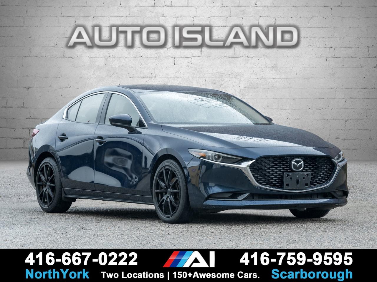 LEATHER SEATS, BOSE SOUND SYSTEM, HEAD-UP DISPLAY, ADAPTIVE CRUISE, LANE KEEP ASSIST, HEATED SEATS & STEERING WHEEL, SUNROOF, REAR CAMERA, APPLE CARPLAY/ANDROID AUTO.     Accident-free and dealer serviced since new, this 2019 Mazda3 GT with the Premium Package blends sleek design with top-tier comfort and technology. The cabin features refined leather seating, a Bose premium audio system, and a head-up display for a modern, driver-focused experience. With its heated seats and steering wheel, sunroof, and advanced safety suite including lane keep assist and adaptive cruise control, this Mazda3 offers sophistication, reliability, and driving enjoyment in equal measure.         Auto Island Inc., North York  2555 Steeles Ave. West    www.autoislandinc.com     4.7 Google Rating and over 150 vehicles in stock, with more arriving daily! We take pride in offering top-quality vehicles and exceptional service. Our full-service mechanical shop is ready for all your maintenance needs, and every vehicle is professionally detailed and inspected – buy with confidence!    Payments as low as $0 down, up to 84 months, OAC. Good credit, bad credit, new credit? No problem – everyone’s approved! Easy online credit application available . Rates starting at 6.95% OAC – please call for details.    Please note: All prices are plus applicable taxes (HST) and licensing. No hidden surprises—just great vehicles and transparent deals. Certification is available for an additional $899. Without certification, as per OMVIC regulations, the vehicle is not drivable, not E-tested, and not certified.    Proudly serving the GTA and beyond: Peel, Halton, Brampton, Toronto, Burlington, Milton, Mississauga, Hamilton, Cambridge, London, Kitchener, Guelph, Orangeville, Newmarket, Barrie, Markham, Bolton, Caledon, Vaughan, Woodbridge, Etobicoke, Oakville, and more.    We carry all makes and models, including Mercedes, BMW, Audi, Jaguar, VW, Maserati, Porsche, Land Rover, Range Rover, Chrysler, Jeep, Honda, Toyota, Lexus, Infiniti, Acura, and more.