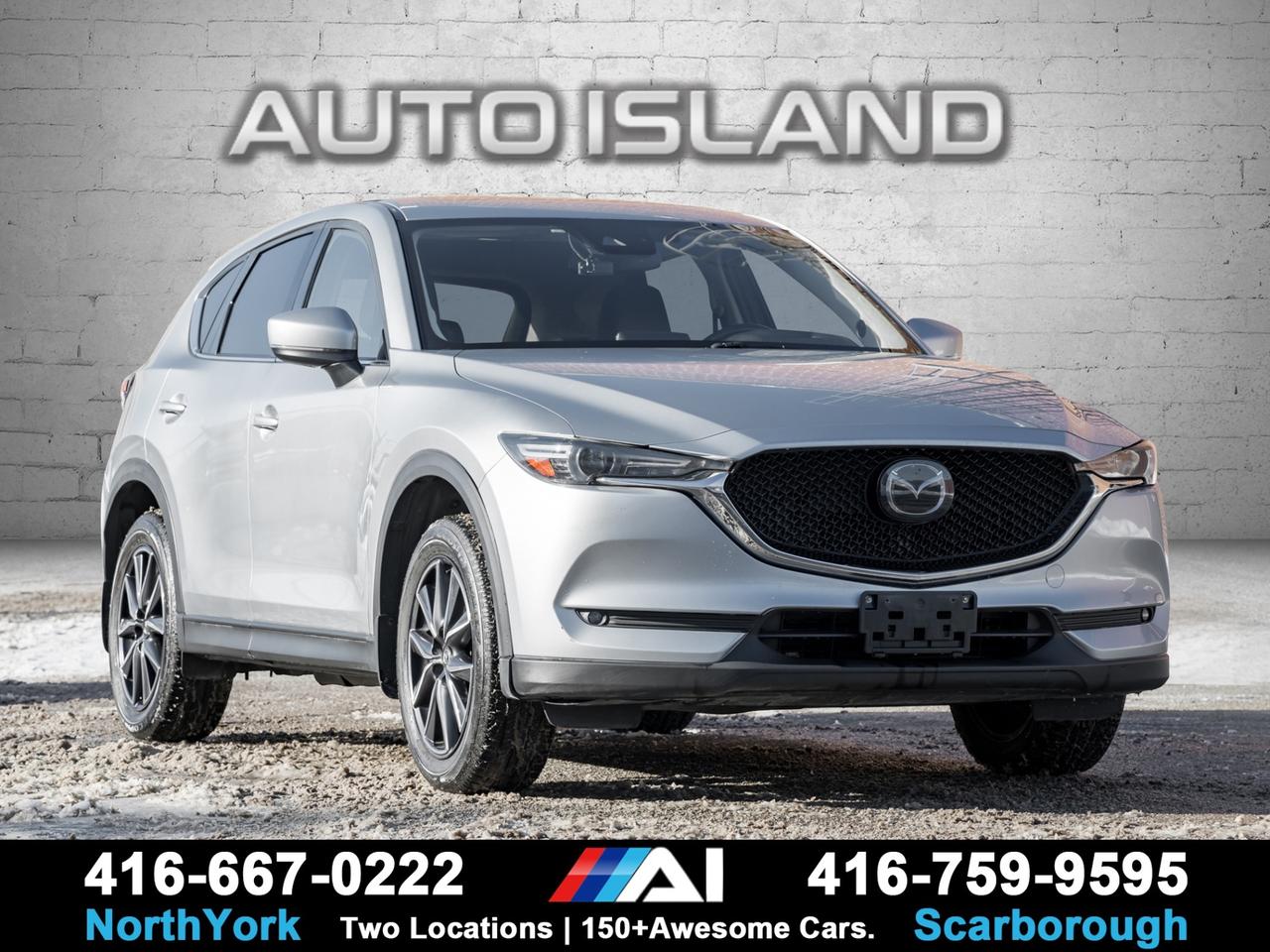LEATHER INTERIOR, SUNROOF, HEATED SEATS, NAVIGATION, BACKUP CAMERA, BOSE AUDIO, AWD, DEALER SERVICED, ACCIDENT FREE.     This 2017 Mazda CX-5 GT Grand Touring is a sharp, upscale SUV that’s been dealer serviced and comes accident free. The GT trim gives it a premium feel with leather seating, a power sunroof, navigation, and a Bose sound system that makes every drive more enjoyable. It handles confidently with all-wheel drive and offers a comfortable, well-finished cabin that still feels modern. Clean history, strong maintenance, and Mazda’s engaging drive make this a standout compact SUV.         Auto Island Inc., North York  2555 Steeles Ave. West    www.autoislandinc.com     4.7 Google Rating and over 150 vehicles in stock, with more arriving daily! We take pride in offering top-quality vehicles and exceptional service. Our full-service mechanical shop is ready for all your maintenance needs, and every vehicle is professionally detailed and inspected – buy with confidence!    Payments as low as $0 down, up to 84 months, OAC. Good credit, bad credit, new credit? No problem – everyone’s approved! Easy online credit application available . Rates starting at 6.95% OAC – please call for details.    Please note: All prices are plus applicable taxes (HST) and licensing. No hidden surprises—just great vehicles and transparent deals. Certification is available for an additional $899. Without certification, as per OMVIC regulations, the vehicle is not drivable, not E-tested, and not certified.    Proudly serving the GTA and beyond: Peel, Halton, Brampton, Toronto, Burlington, Milton, Mississauga, Hamilton, Cambridge, London, Kitchener, Guelph, Orangeville, Newmarket, Barrie, Markham, Bolton, Caledon, Vaughan, Woodbridge, Etobicoke, Oakville, and more.    We carry all makes and models, including Mercedes, BMW, Audi, Jaguar, VW, Maserati, Porsche, Land Rover, Range Rover, Chrysler, Jeep, Honda, Toyota, Lexus, Infiniti, Acura, and more.