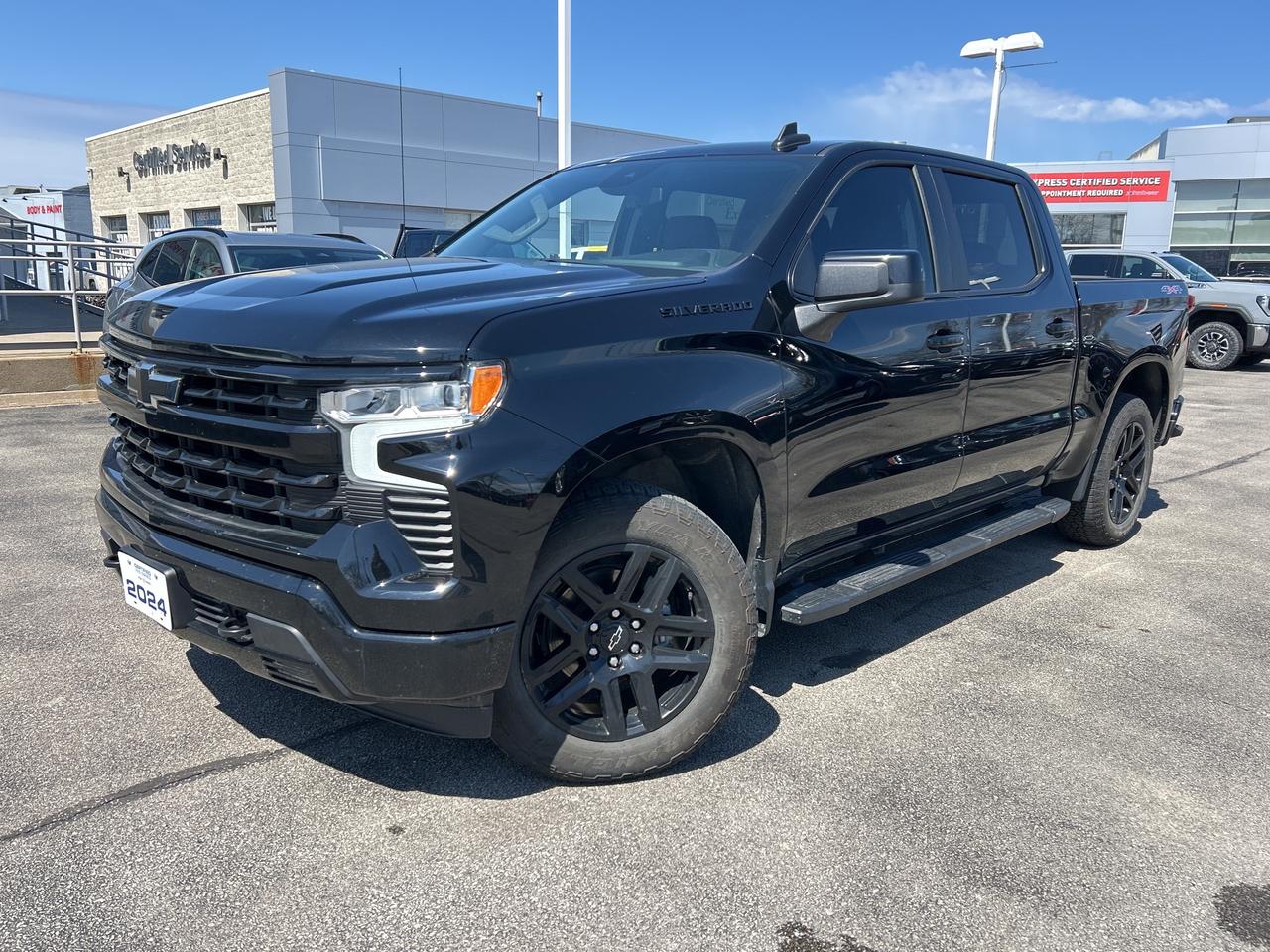 2024 Chevrolet Silverado 1500 RST      *REMOTE START*, *NAVIGATION*, *BACK-UP CAMERA*, *NOT A RENTAL*, *LOCAL TRADE*, *GM FACTORY CERTIFIED*, *MARKET VALUE PRICING*, *ONE OWNER*, 20 BLACK GLOSS WHEELS,, CHEVY SAFETY ASSIST PKG., TRAILERING PKG., 8-Speed Automatic, 4WD, Jet Black w/Cloth Seat Trim.      Recent Arrival!    2.7L I4 Turbocharged DOHC 16V LEV3-SULEV30 310hp 8-Speed Automatic 4WD      Certified. Certification Program Details: * 3.99% APR Financing on Select Models for 24mo* of PreOwned Vehicles * 3-month or 5,000 kilometres Comprehensive Limited Warranty Coverage * 24/7 Roadside Assistance * CARFAX® Vehicle History Report Sirius XM 3 months prepaid service * 150-Point Inspection * 30 Days or 2,500 kilometres exchange privilege SEE DEALER FOR ADDITIONAL DETAILS      John Bear Buick GMC offers many automotive products and services. When you visit our store, what you can expect is quality both in our selection of pre-owned vehicles and from our world-class sales team. We offer Market Based Pricing with some of the best value in the Niagara region.