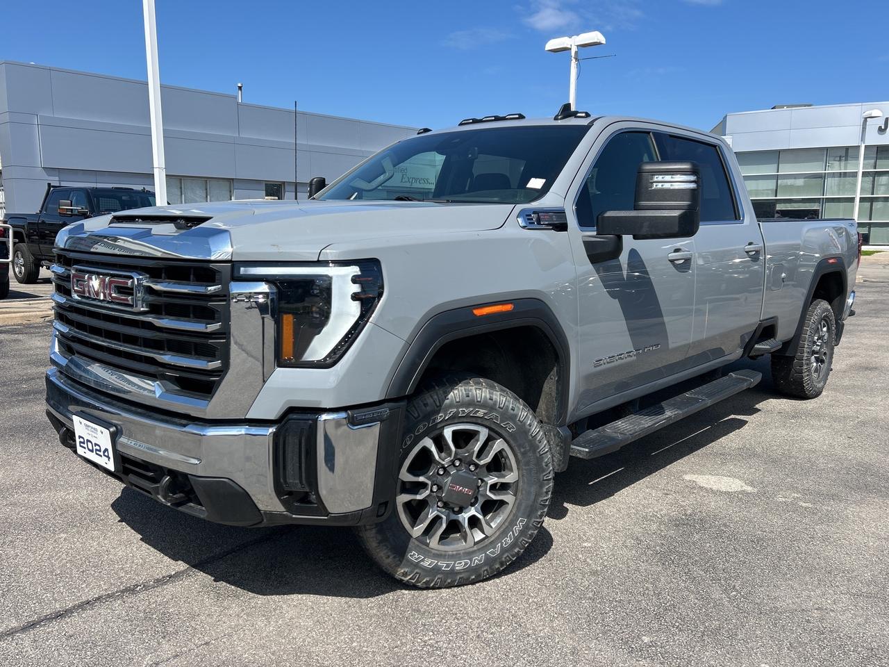 2024 GMC Sierra 2500HD SLE      *REMOTE START*, *BACK-UP CAMERA*, *GM FACTORY CERTIFIED*, *MARKET VALUE PRICING*, *ONE OWNER*, *CLEAN CARFAX REPORT*, TRAILERING EQUIPMENT, 10-Speed Automatic, 4WD, Jet Black w/Cloth Seat Trim, 10-Way Power Driver Seat Adjuster w/Lumbar, 120-Volt Bed Mounted Power Outlet, 120-Volt Instrument Panel Power Outlet, 2 Charge-Only Rear USB Ports, A/C w/Dual-Zone Automatic Climate Control, Adaptive Cruise Control, Cloth Rear Seat w/Storage Package, Hitch Guidance w/Hitch View, In-Vehicle Trailering System App, LED Cargo Area Lighting, LED Fog Lamps, LED Smoked Amber Roof Marker Lamps, Manual Tilt-Wheel/Telescoping Steering Column, Power Sliding Rear Window w/Defogger, Preferred Package, SLE Convenience Package, Snow Plow Prep/Camper Package, Universal Home Remote.      Recent Arrival!    6.6L V8 10-Speed Automatic 4WD      Certified. Certification Program Details: * 3.99% APR Financing on Select Models for 24mo* of PreOwned Vehicles * 3-month or 5,000 kilometres Comprehensive Limited Warranty Coverage * 24/7 Roadside Assistance * CARFAX® Vehicle History Report Sirius XM 3 months prepaid service * 150-Point Inspection * 30 Days or 2,500 kilometres exchange privilege SEE DEALER FOR ADDITIONAL DETAILS      John Bear Buick GMC offers many automotive products and services. When you visit our store, what you can expect is quality both in our selection of pre-owned vehicles and from our world-class sales team. We offer Market Based Pricing with some of the best value in the Niagara region.