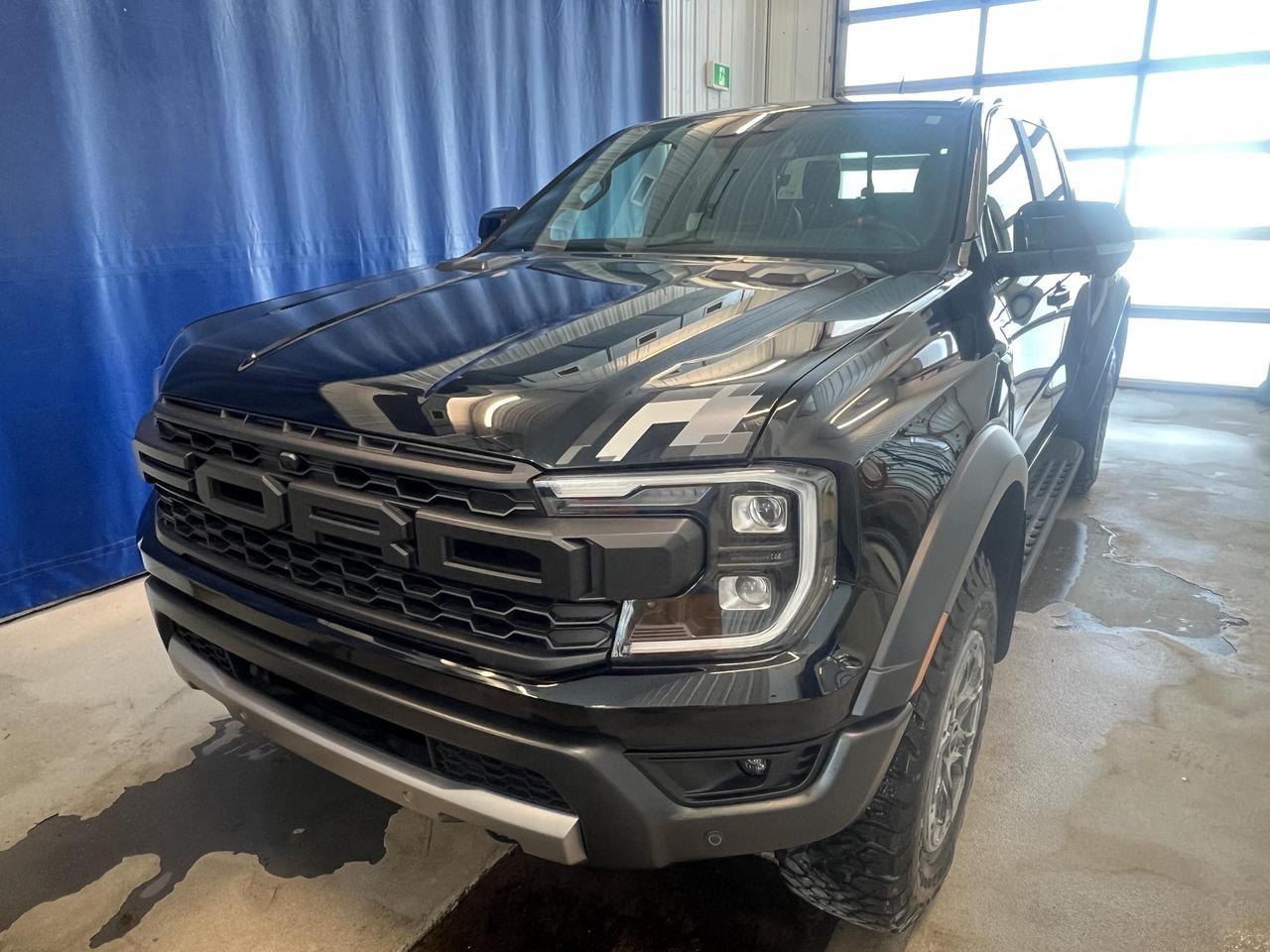 <p>Looking for a pickup thats ready to conquer any terrain? Feast your eyes on the brand-new 2025 Ford Ranger Raptor, now available at Merit Ford Sales Ltd. This beast of a truck, cloaked in sleek Shadow Black, is engineered for adventure and built to impress. With its powerful engine, advanced 4-wheel drive system, and a suite of cutting-edge features, the Ranger Raptor is more than just a truck; its a statement. Step inside the Ebony interior and experience a world of comfort and technology designed to elevate every drive.</p>
<p>This isnt your average pickup. The 2025 Ford Ranger Raptor is packed with features that make it stand out from the crowd. From its rugged exterior to its luxurious interior, every detail has been meticulously crafted to deliver an unparalleled driving experience. Whether youre navigating city streets or exploring off-road trails, the Ranger Raptor provides the performance, capability, and style you crave. Visit Merit Ford Sales Ltd. today and discover the thrill of driving a true off-road champion.</p>
<p>Here are five features that make the 2025 Ford Ranger Raptor a must-have:</p>
<ul>
<li><strong>Adaptive Cruise Control:</strong> Effortlessly maintain your desired speed and distance from the vehicle ahead, making highway driving a breeze.</li>
<li><strong>Heated Leather Steering Wheel:</strong> Enjoy ultimate comfort with a warm, luxurious steering wheel, perfect for those chilly Canadian mornings.</li>
<li><strong>Aerial View Camera System:</strong> Navigate tight spots and park with confidence, thanks to the comprehensive 360-degree view.</li>
<li><strong>BLIS with Trailer Tow Coverage Blind Spot:</strong> Stay safe on the road with this advanced system that alerts you to vehicles in your blind spots, even when towing.</li>
<li><strong>Full-Time Four-Wheel Drive:</strong> Conquer any terrain with the confidence of a robust 4-wheel drive system, ready for any adventure.</li>
</ul>
<p><strong><em>Powered by AutoIntelligence</em></strong>
Vehicle information has been generated using artificial intelligence and is provided for informational purposes only. While efforts are made to ensure accuracy, please confirm all details directly with the dealer.</p>