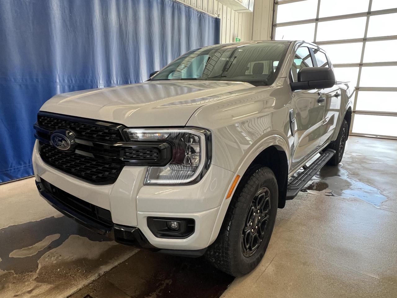 <p><strong>The 2026 Ford Ranger XLT at Merit Ford Sales is built for those who demand capability without compromise. </strong>Equipped with the 2.3L EcoBoost engine, 4WD, and the 301A High Equipment Group package, this Crew Cab comes ready for whatever the job or the weekend throws at it. With only 12 km on the odometer, this is as fresh as it gets.<br><br>- 2.3L EcoBoost 4-cylinder engine paired with a smooth automatic transmission and part-time 4WD serious capability on and off the road<br>- Equipment Group 301A High trim package, elevating this Ranger well above the base XLT configuration<br>- Black Appearance Package (76J) for a sharper, more aggressive exterior look<br>- Black Running Boards for easier cab access and a cohesive blacked-out aesthetic<br>- Engine Block Heater included a practical must-have for Canadian winters<br>- BLIS (Blind Spot Information System) with Trailer Tow Coverage especially useful when hauling<br>- Reverse Brake Assist and Collision Mitigation for added confidence in tight spots<br>- Striking Avalanche Grey exterior paired with Ebony interior a clean, professional combination<br><br>Ready to make this Ranger yours? Visit Merit Ford Sales to book a test drive, ask our team any questions, or get started on your purchase today in person or by reaching out online.</p>
