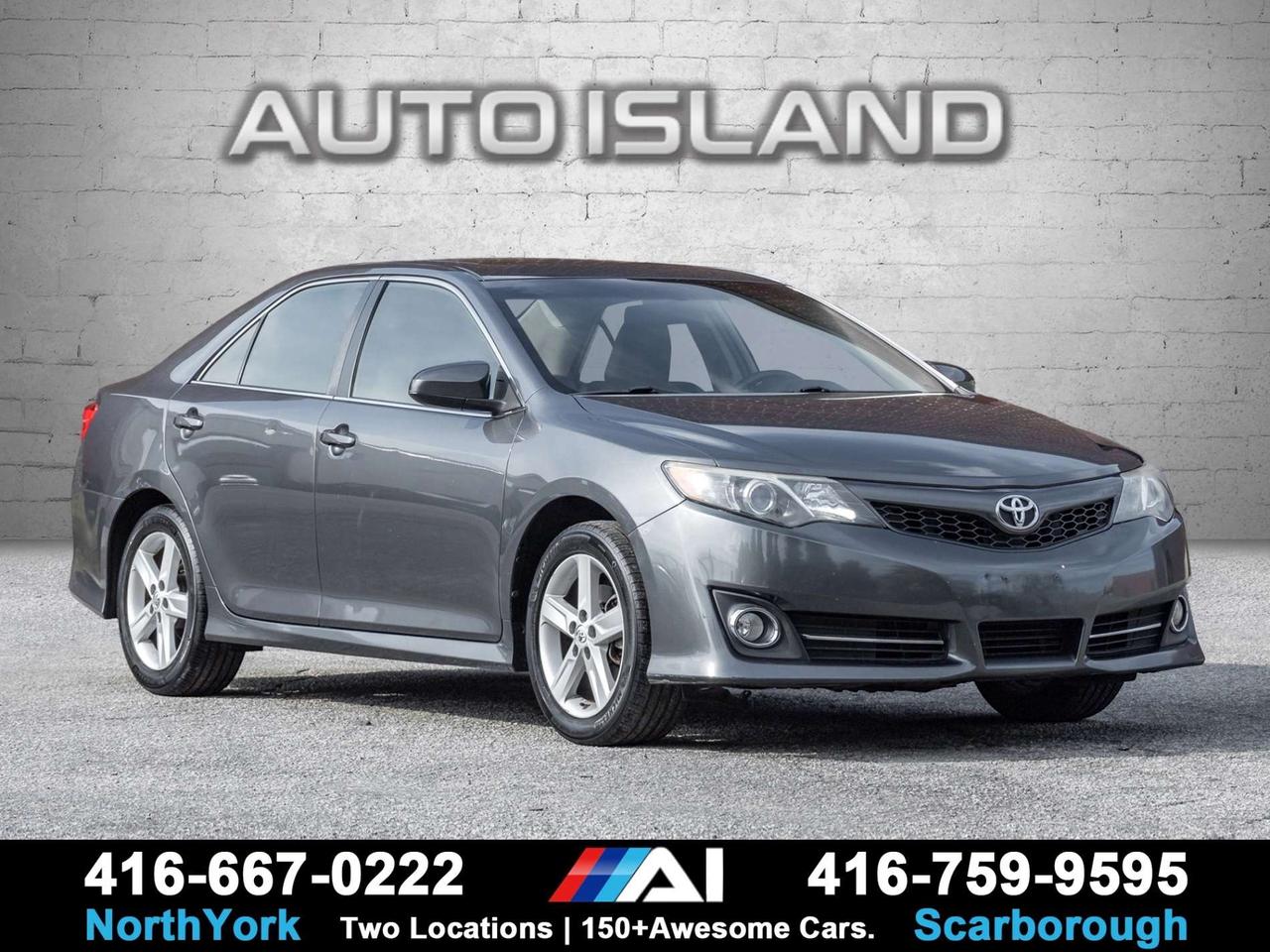 DEALER SERVICED, 2.5L 4-CYLINDER, SPORT-TUNED SUSPENSION, ALLOY WHEELS, HEATED SEATS, BACKUP CAMERA, BLUETOOTH, KEYLESS ENTRY, POWER DRIVERS SEAT, STEERING WHEEL AUDIO CONTROLS, CRUISE CONTROL.<br><br>This 2014 Toyota Camry SE combines Toyotas reputation for reliability with a sportier look and feel. The SE trim adds sport-tuned suspension, sporty styling, alloy wheels, and a more supportive interior , while still giving you the practicality, fuel efficiency, and everyday comfort youd expect from a Camry. Dealer serviced and ready to go, its a great choice for someone looking for a dependable sedan with a little more personality.<br><br>Auto Island Inc., North York<br>2555 Steeles Ave. West<br><br>www.autoislandinc.com <br><br>4.7 Google Rating and over 150 vehicles in stock, with more arriving daily! We take pride in offering top-quality vehicles and exceptional service. Our full-service mechanical shop is ready for all your maintenance needs, and every vehicle is professionally detailed and inspected  buy with confidence!<br><br>Payments as low as $0 down, up to 84 months, OAC. Good credit, bad credit, new credit? No problem  everyones approved! Easy online credit application available . Rates starting at 6.95% OAC  please call for details.<br><br>Please note: All prices are plus applicable taxes (HST) and licensing. No hidden surprisesjust great vehicles and transparent deals. Certification is available for an additional $899. Without certification, as per OMVIC regulations, the vehicle is not drivable, not E-tested, and not certified.<br><br>Proudly serving the GTA and beyond: Peel, Halton, Brampton, Toronto, Burlington, Milton, Mississauga, Hamilton, Cambridge, London, Kitchener, Guelph, Orangeville, Newmarket, Barrie, Markham, Bolton, Caledon, Vaughan, Woodbridge, Etobicoke, Oakville, and more.<br><br>We carry all makes and models, including Mercedes, BMW, Audi, Jaguar, VW, Maserati, Porsche, Land Rover, Range Rover, Chrysler, Jeep, Honda, Toyota, Lexus, Infiniti, Acura, and more.<br><br> <br><br><br><br><br><br> <br><br><br><br><br><br><br><br><br>
