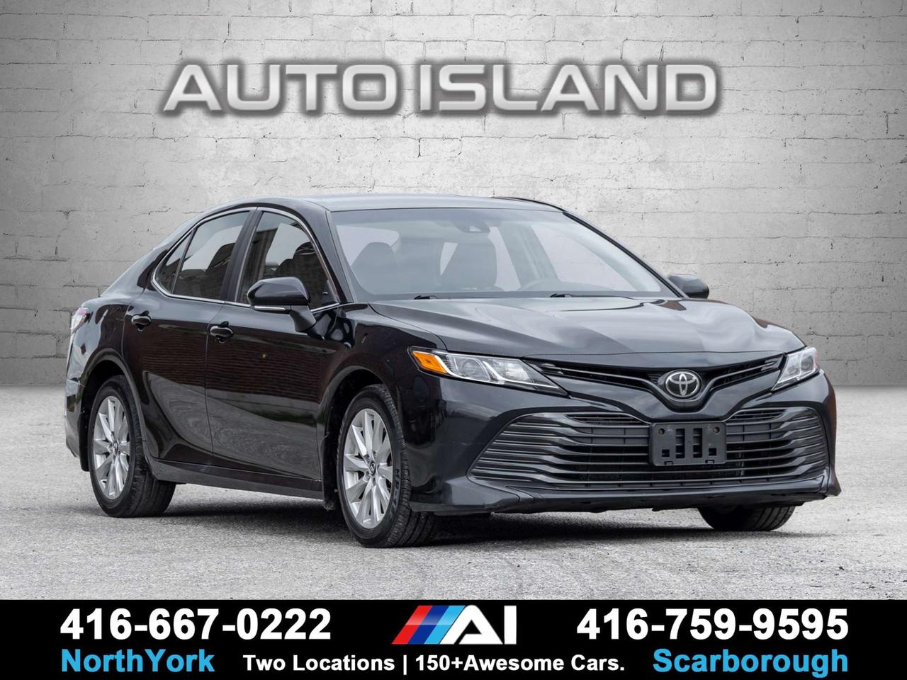 WELL SERVICED, 2.5L 4-CYLINDER, HEATED FRONT SEATS, APPLE CARPLAY, ANDROID AUTO, 17 ALLOY WHEELS, BACKUP CAMERA, TOYOTA SAFETY SENSE, NO ACCIDENTS, DEALER SERVICED.<br><br>This 2020 Toyota Camry LE is a well-rounded sedan with the practicality, comfort and proven reliability that make the Camry such an easy choice for everyday driving. The LE trim gives you a comfortable cabin with heated front seats, Apple CarPlay, Android Auto and a backup camera, while Toyota Safety Sense adds a strong suite of driver-assistance features. Powered by the efficient 2.5L 4-cylinder engine, it delivers a smooth balance of performance and fuel economy. With no accidents and dealer-service history. <br><br><br>Auto Island Inc., North York<br>2555 Steeles Ave. West<br><br>www.autoislandinc.com <br><br>4.7 Google Rating and over 150 vehicles in stock, with more arriving daily! We take pride in offering top-quality vehicles and exceptional service. Our full-service mechanical shop is ready for all your maintenance needs, and every vehicle is professionally detailed and inspected – buy with confidence!<br><br>Payments as low as $0 down, up to 84 months, OAC. Good credit, bad credit, new credit? No problem – everyone’s approved! Easy online credit application available . Rates starting at 8.49% OAC – please call for details.<br><br>Please note: All prices are plus applicable taxes (HST) and licensing. No hidden surprises—just great vehicles and transparent deals. Certification is available for an additional $999. Without certification, as per OMVIC regulations, the vehicle is not drivable, not E-tested, and not certified.<br><br>Proudly serving the GTA and beyond: Peel, Halton, Brampton, Toronto, Burlington, Milton, Mississauga, Hamilton, Cambridge, London, Kitchener, Guelph, Orangeville, Newmarket, Barrie, Markham, Bolton, Caledon, Vaughan, Woodbridge, Etobicoke, Oakville, and more.<br><br>We carry all makes and models, including Mercedes, BMW, Audi, Jaguar, VW, Maserati, Porsche, Land Rover, Range Rover, Chrysler, Jeep, Honda, Toyota, Lexus, Infiniti, Acura, and more.<br><br> <br><br><br><br><br><br> <br><br><br><br><br><br><br><br><br>