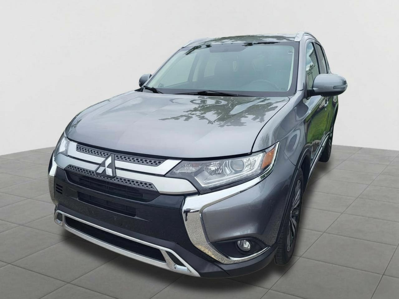 <p>Carfax Claim 7,484.95 from 2022.</p><p>Looking for a versatile and reliable SUV thats ready for all your adventures? Barrie Mitsubishi is excited to offer this pre-owned 2020 Mitsubishi Outlander EX-L, a fantastic choice for families and individuals alike. This spacious SUV boasts a comfortable interior, advanced technology, and the capability to handle Canadian weather with its intelligent 4-wheel drive system. Whether youre navigating city streets or venturing out for a weekend getaway, the Outlander EX-L provides a smooth and enjoyable driving experience for everyone on board.</p><p>With its practical SUV/Crossover design, this Outlander EX-L offers ample cargo space for groceries, gear, or luggage, making it incredibly convenient for everyday errands and longer trips. The smooth Variable Transmission ensures efficient fuel consumption, while the 4-wheel drive system gives you added confidence and stability in various road conditions, from rain to snow. This 2020 model is a well-maintained vehicle thats eager to hit the road and become your trusted companion.</p><p>Here are five features of this 2020 Mitsubishi Outlander EX-L that truly stand out:</p><ul><li><strong>Intelligent 4-Wheel Drive System:</strong> Conquer any road condition with confidence. This advanced system provides superior traction and stability, ensuring a secure and capable drive no matter the weather.</li><li><strong>Spacious and Versatile SUV Body Style:</strong> Enjoy the best of both worlds with ample passenger room and generous cargo capacity, perfect for hauling everything from groceries to sports equipment.</li><li><strong>Smooth and Efficient Variable Transmission:</strong> Experience a seamless driving experience with optimized fuel economy, making every journey more enjoyable and economical.</li><li><strong>Comfortable and Feature-Rich EX-L Trim:</strong> This trim level offers a premium feel and a host of desirable amenities designed to enhance your driving pleasure.</li><li><strong>Ready for Any Adventure with 4 Doors:</strong> Offering easy access for passengers and quick loading for cargo, the four-door configuration of this Outlander makes practicality a breeze.</li></ul><p>CARFAX CLAIM: $7,484.95 from 2022.</p><p><strong><em>Powered by AutoIntelligence&trade;</em></strong></p><p>Vehicle information has been generated using artificial intelligence and is provided for informational purposes only. While efforts are made to ensure accuracy, please confirm all details directly with the dealer.</p>